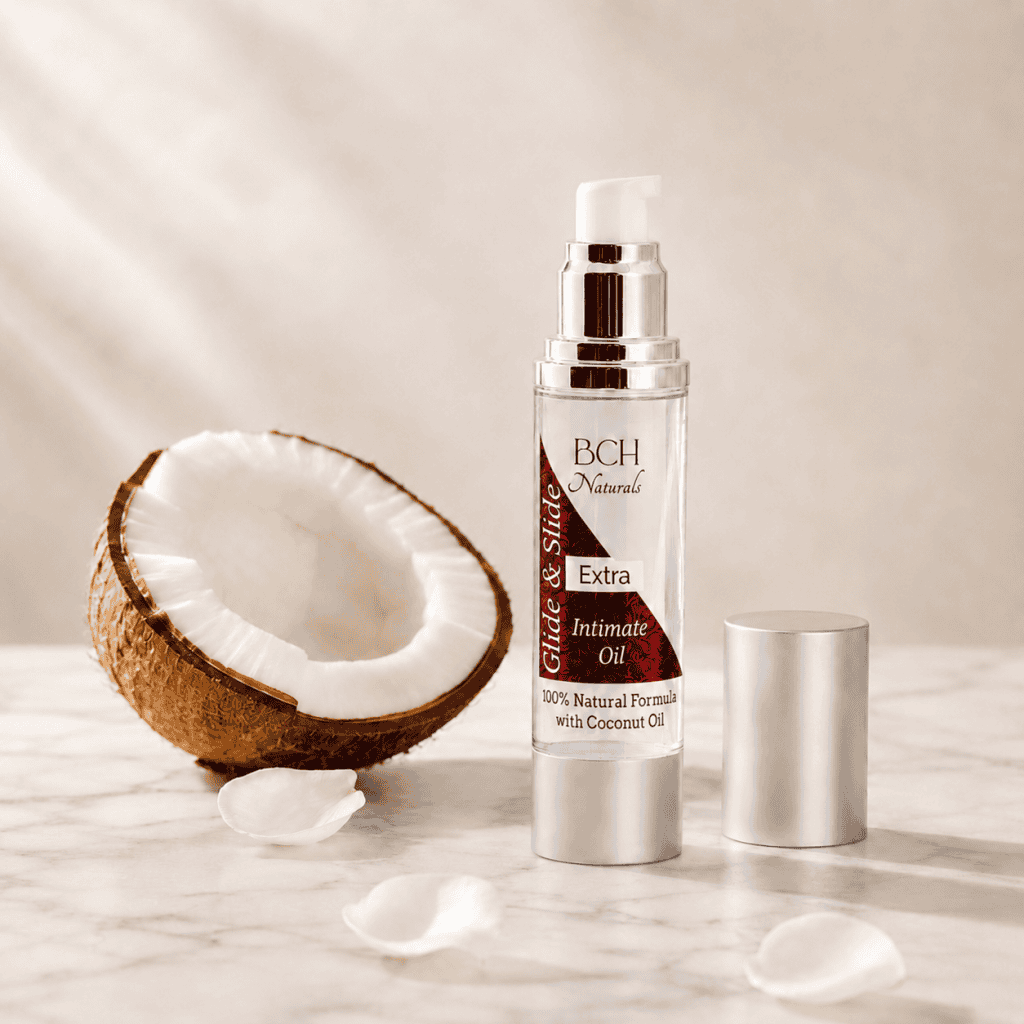 Glide & Slide Intimate Oil with coconut half with white rose petals