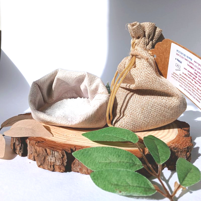 Bath Salts in a Hemp Sack one open one tied on a slice of wood