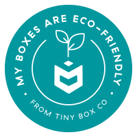 Eco-friendly packaging badge from Tiny Box Co with plant icon and a circle text.