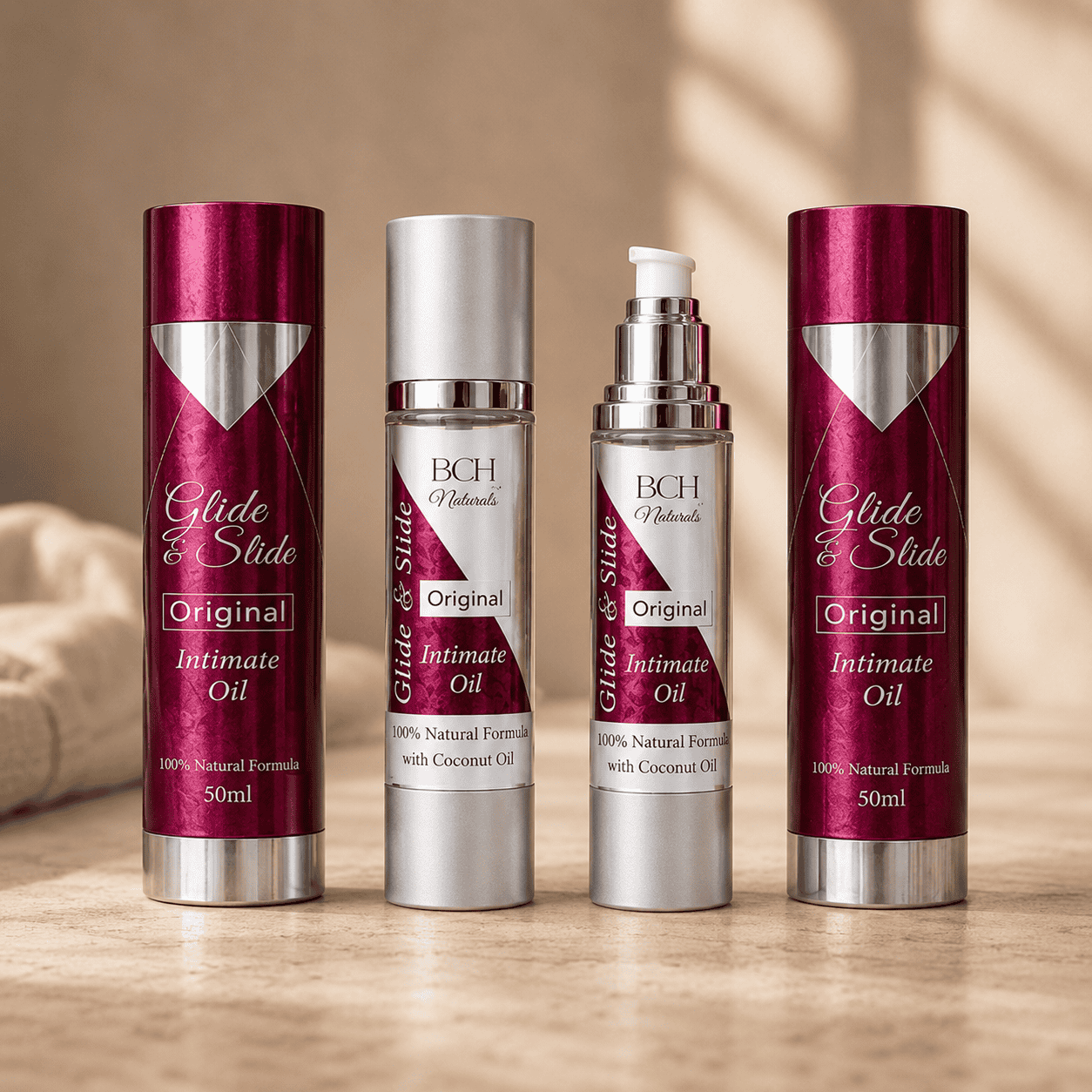 Warm image of Glide & Slide Original Twin Pack – Natural Coconut Lubricant Oil two bottles on a marble slab